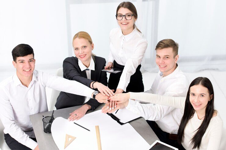 elevated-view-businessman-businesswoman-stacking-each-other-s-hand-project_23-2148073310